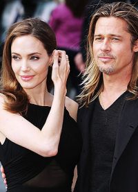 Bradas Pittas su Angelina Jolie ant raudono kilimo